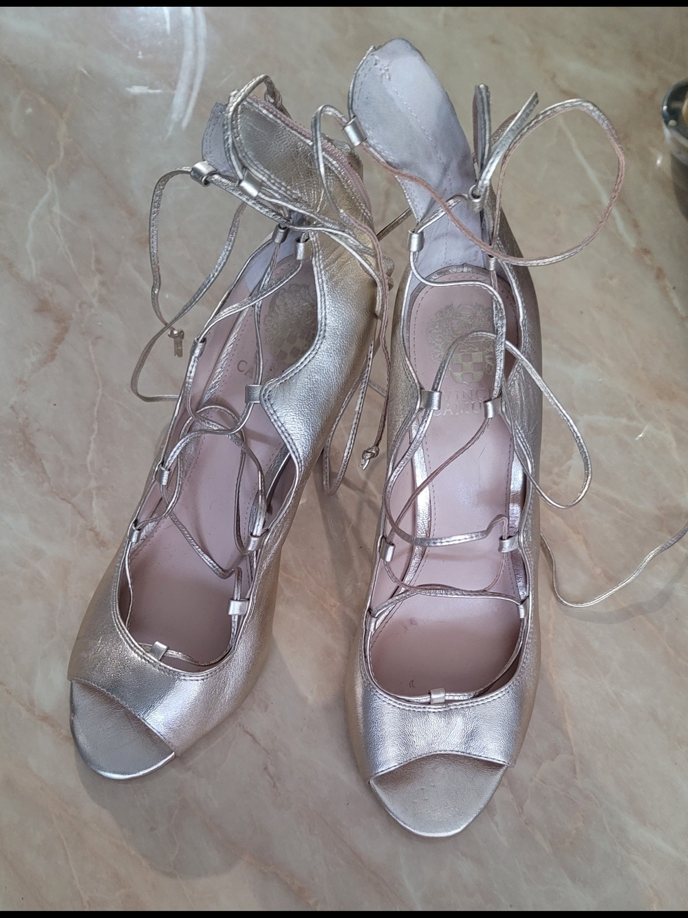 Gold lace-up open-toed shoes by Vince Camuto